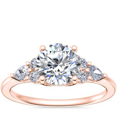 Anillo de compromiso de diamantes redondos y en forma de pera pequeños en oro rosado de 14 k (1/4 qt. total)